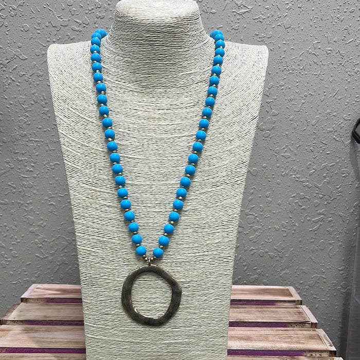 561- Baby Blue Wood Bead Necklace w/ Circle Pendant