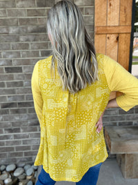 2563- Mustard Solid Front & Bandana Print Back Shark Bite Long Sleeve Top