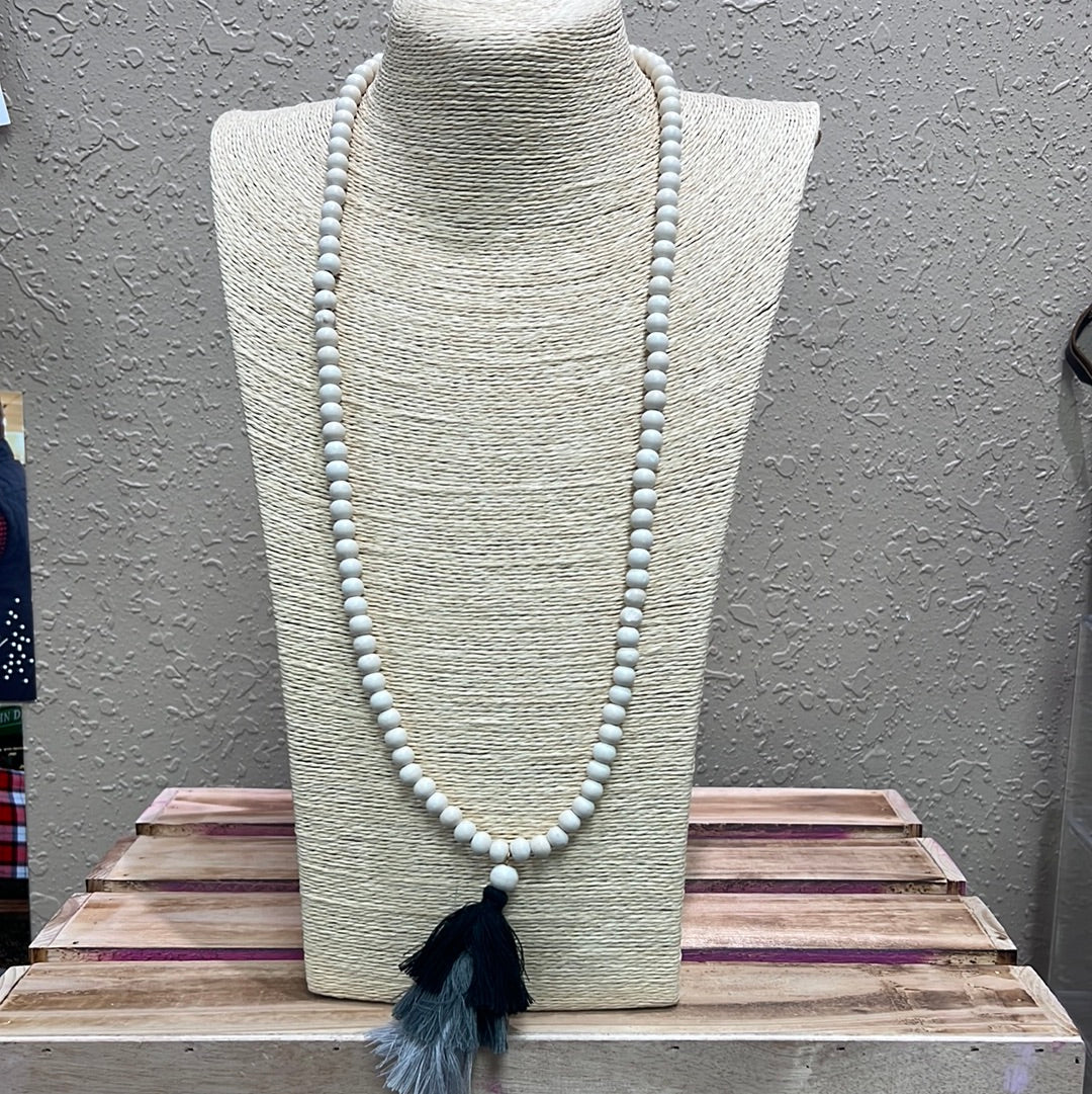 579- Cream Wood Bead Necklace w/ Black & Gray Fringe Tassel