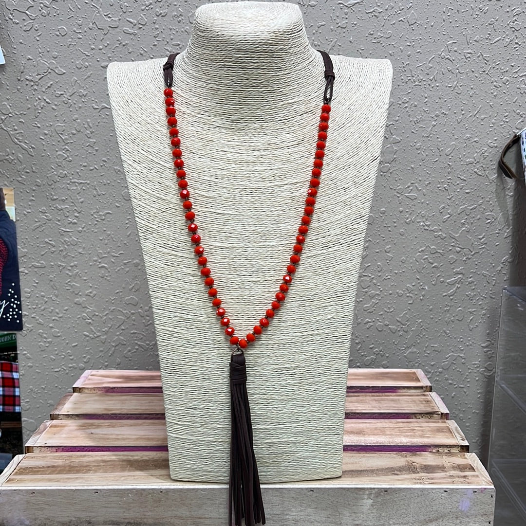 527- Orange Beaded Necklace w/ Brown Leather Tassel Necklace