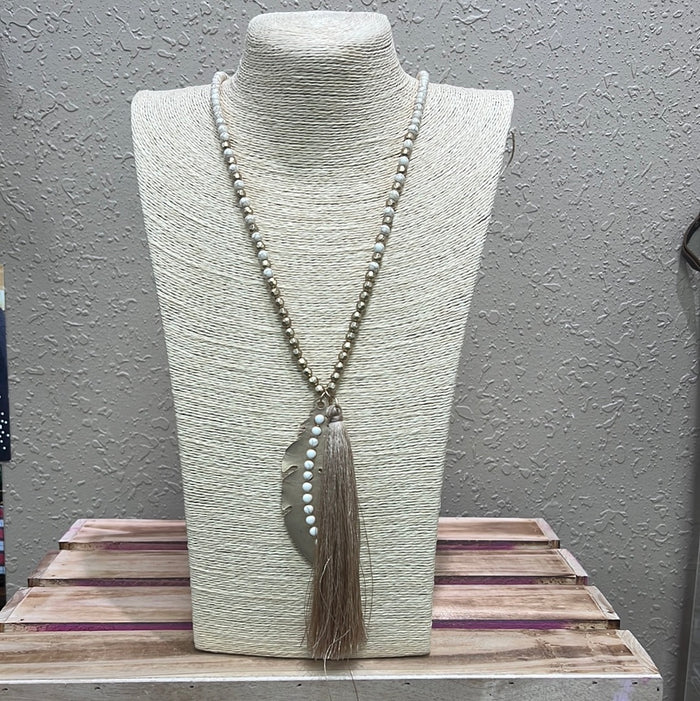 648- Gold Tassel w/ Feather Pendant