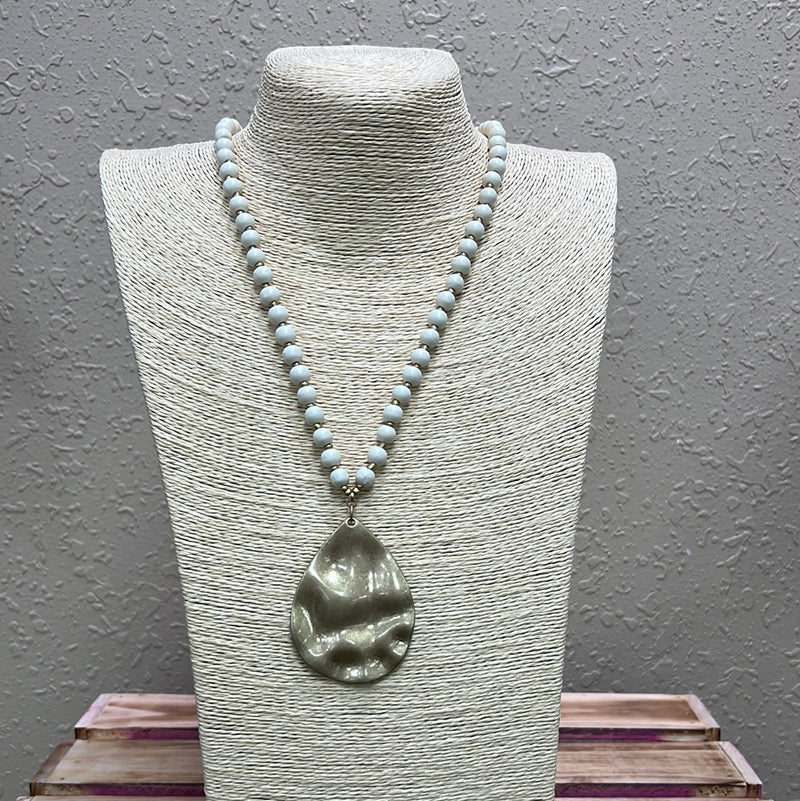 724- Cream Wood Bead w/ Gold Pendant