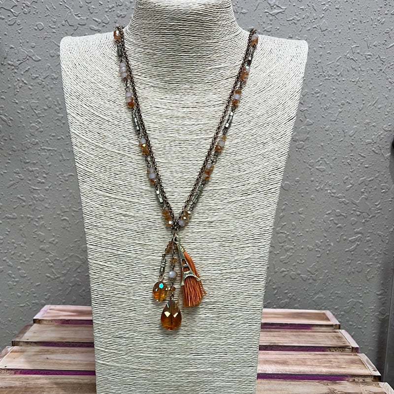 532- Orange Beaded Necklace w/ Multi Detail Pendants