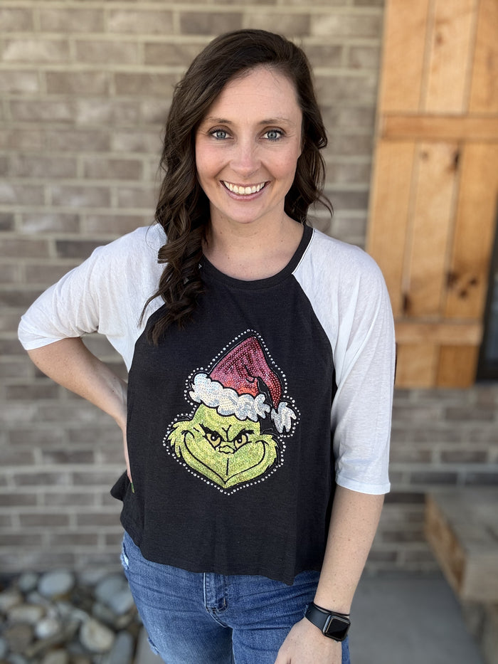 8361- Black w/ White Sleeves Raglan Tee w/ Sequin Grinch *BRUMLEYS EXCLUSIVE!*