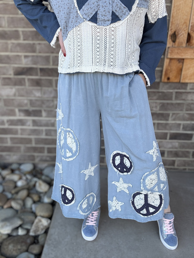 8551- Blue Washed Smocked Peace and Star Patchwork Pants by Oli & Hali