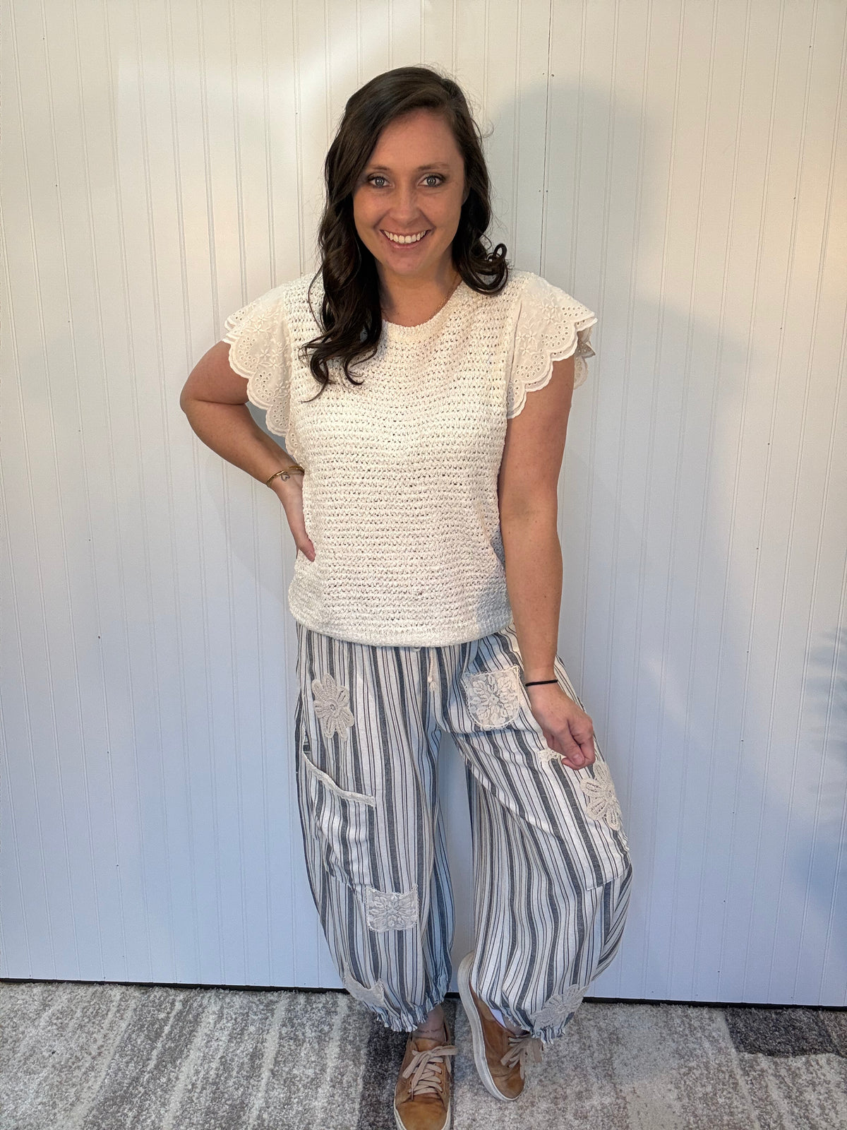 Charcoal striped linen blend balloon pants with lace patchwork details, elastic drawstring waist, and cuffed ankle hem by Mittoshop.