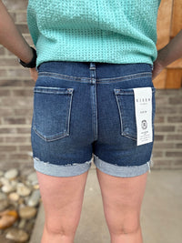 Dark Wash High Rise Raw Hem Cuffed Shorts by Risen