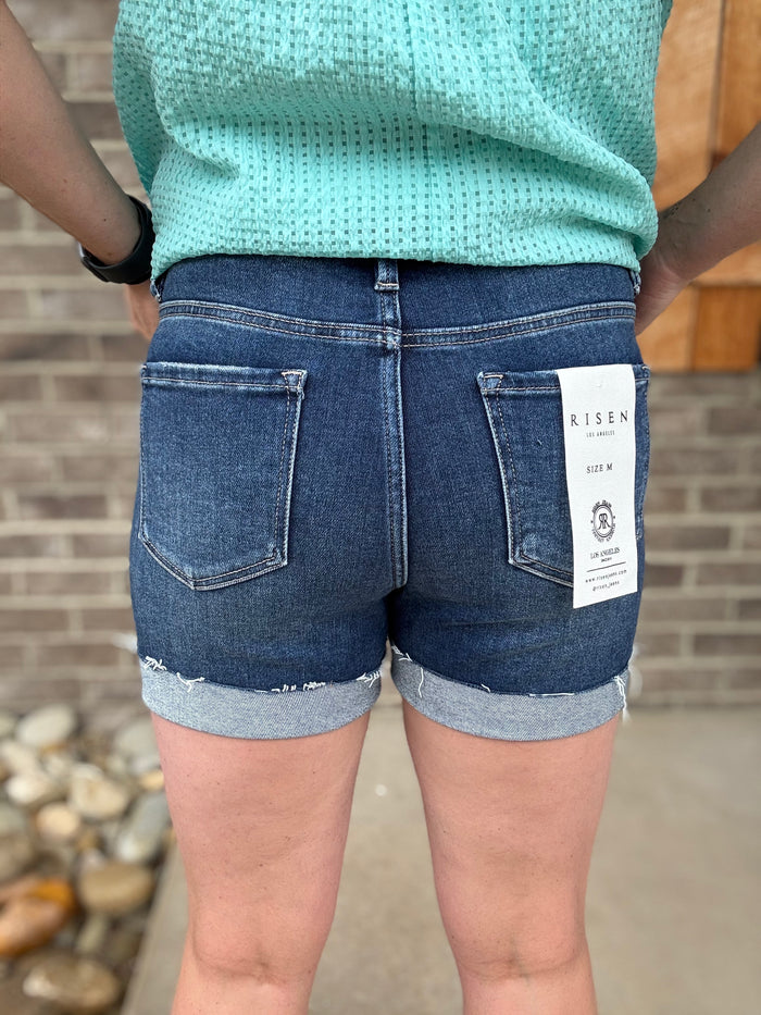 Dark Wash High Rise Raw Hem Cuffed Shorts by Risen