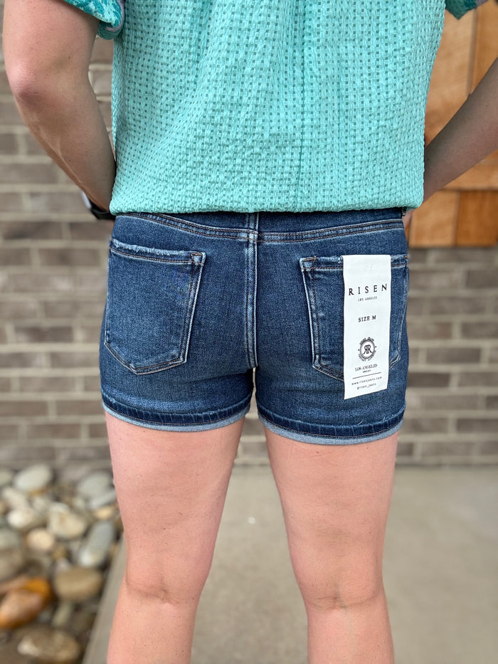 Dark Wash Mid Rise Turn Up Cuff Shorts by Risen