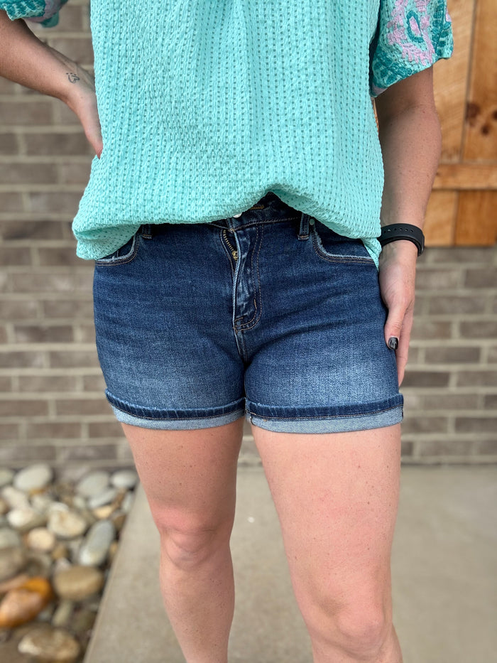 Dark Wash Mid Rise Turn Up Cuff Shorts by Risen