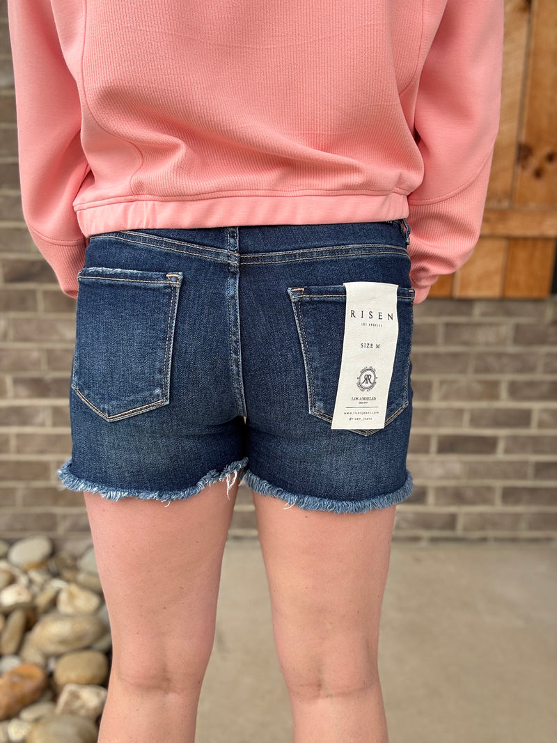 Dark Wash Tummy Control Frey Hem Shorts by Risen Jeans