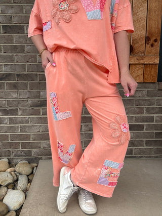 Papaya Mineral Washed LOVE Patched Pants by J. Her