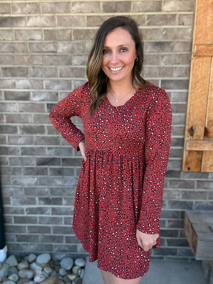 Rust Animal Print Round Neck Babydoll Dress by Haptics