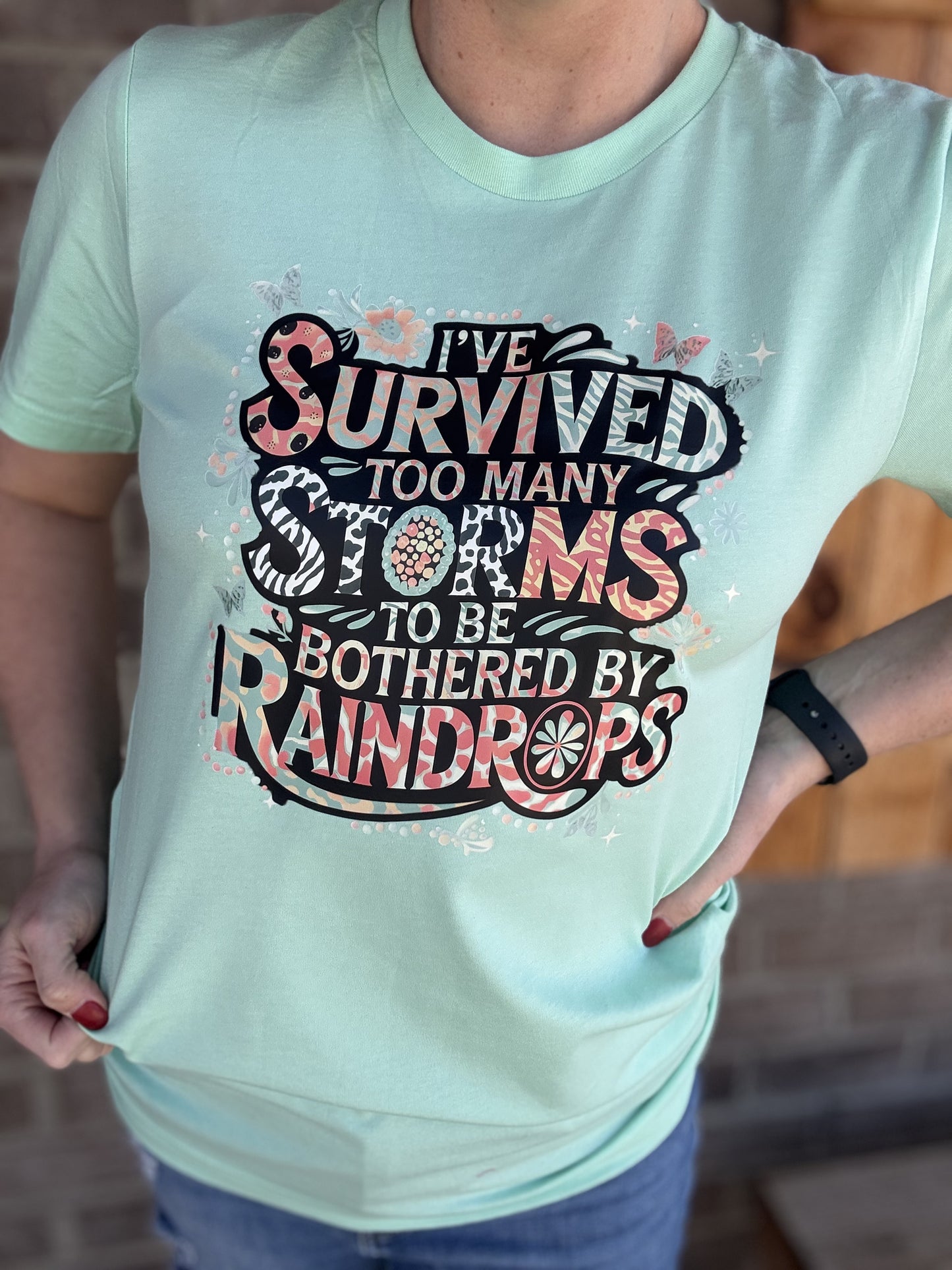 8507- Survived Too Many Storms Short Sleeve Graphic Tee