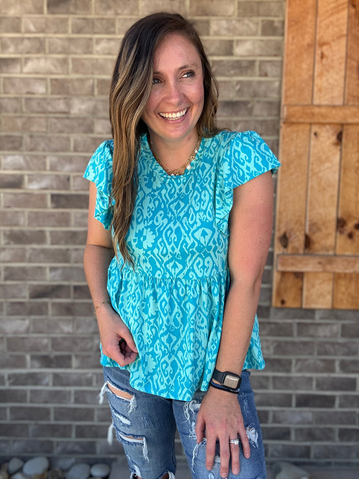 Turquoise Ikat Print Babydoll Knit Top