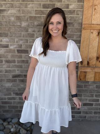 White Smocked Chest w/ Bow Tie Open Back Dress