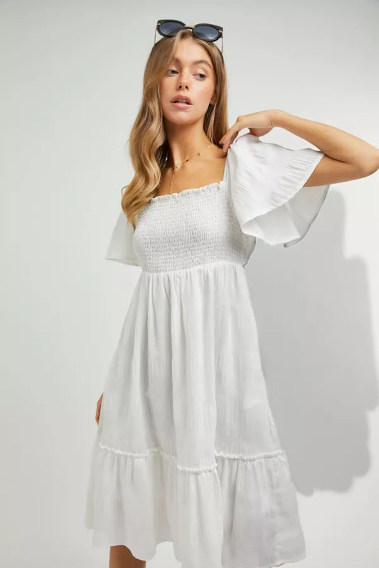 White Smocked Chest w/ Bow Tie Open Back Dress