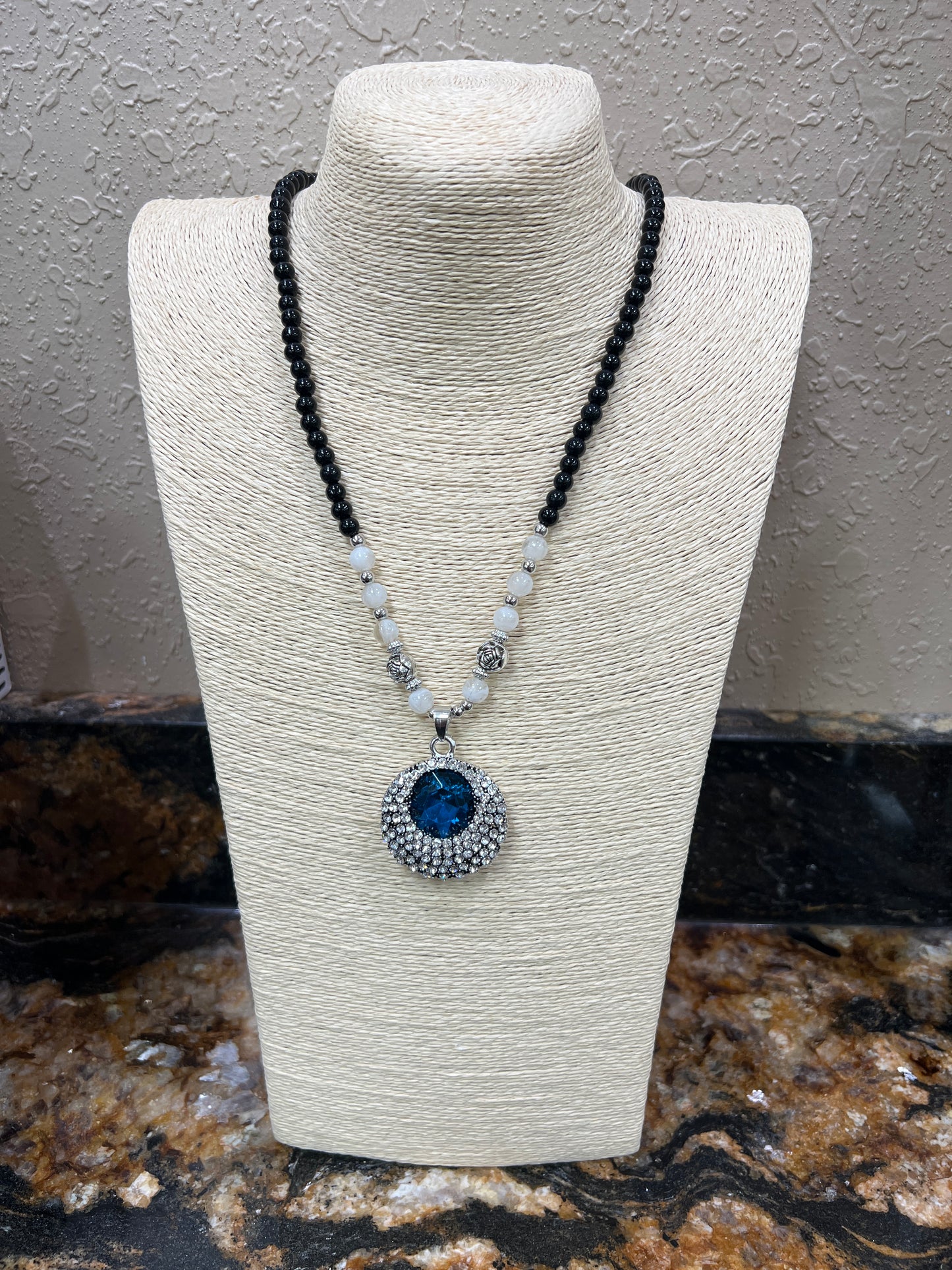 9746- Black Beaded Necklace w/ Blue Crystal Pendant