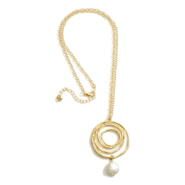 1219-Long Gold Necklace Featuring Circular Pendant