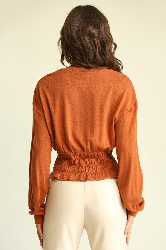 6634- Red Clay Crop Top w/ Smocked Was it & Long Sleeves