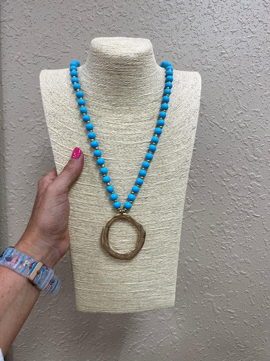 6338- Blue Wood Beaded Necklace w/ Circle Pendant