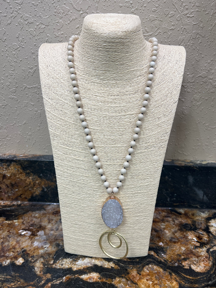 7686- Cream Beaded Stone w/ Gold Pendant